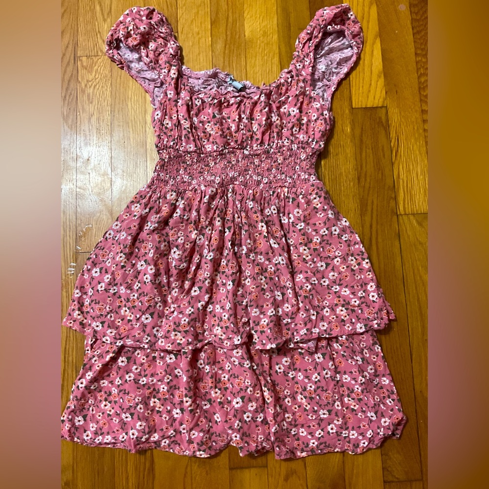 Layered , pink , floral dress .